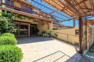 Casa com 3 quartos à venda na rua doutor egydio michaelsen, 62, cavalhada, porto alegre, 198 m2 por r$ 680.000