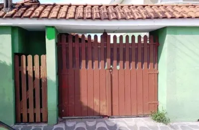 Casa com 2 dormitórios à venda por R$ 500.000,00 - Tupi - Praia Grande/SP