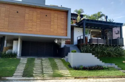 Casa em condomínio fechado com 3 quartos à venda na das flores, 19, morrinhos, garopaba, 388 m2 por r$ 2.900.000