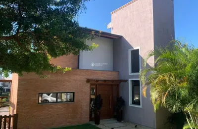 Casa em condomínio fechado com 3 quartos à venda na das amendoeiras, 888, morrinhos, garopaba, 210 m2 por r$ 3.080.000