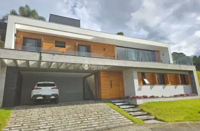 Casa em condomínio fechado com 4 quartos à venda na das flores, 2005, morrinhos, garopaba, 188 m2 por r$ 2.900.000