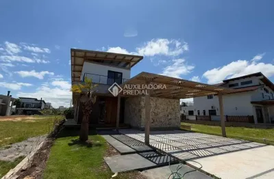 Casa em condomínio fechado com 3 quartos à venda na rodolfo sampaio, 80, zona rural, garopaba, 301 m2 por r$ 2.599.000