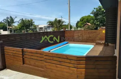 Casa com dois dormitórios sendo um suite em nova tramandai!!!!