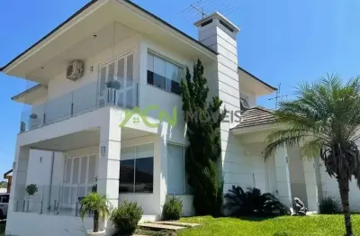 Casa com 3 dormitórios (1 suíte com closet), salão de festas, amplo pátio e acesso para 2 ruas. bairro sol nascente, em estância velha.