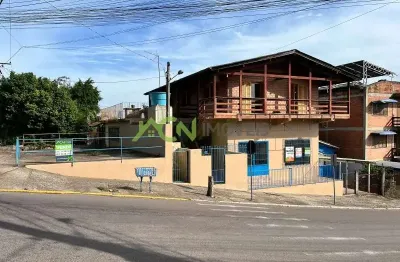 Prédio comercial de esquina com sala/loja térrea, casa no pavimento superior e chalé. esquina com av. presidente lucena, bairro união, estância velha