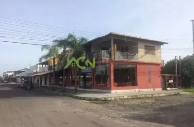 Prédio residencial e comercial em terreno de esquina, na av mariluz, em imbé