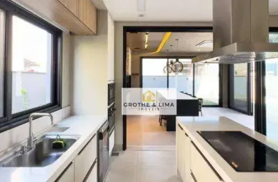 Luxuoso sobrado á venda no alphaville com 4 suítes, toda planejada, e área gourmet com piscina.