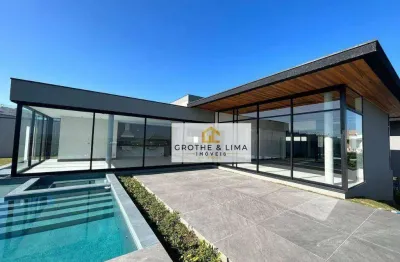 Sobrado com 4 dormitórios à venda, 600 m² por r$ 6.450.000,00 - condomínio reserva do paratehy - são josé dos campos/sp