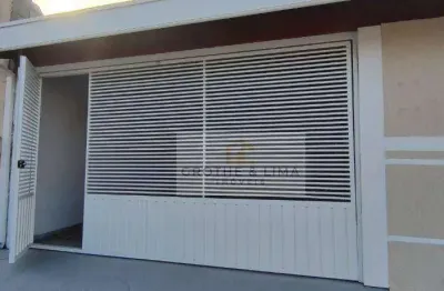 Casa com pé-direito duplo e jardim de inverno no jardim santa júlia