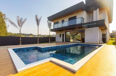 Sobrado com 3 dormitórios à venda, 326 m² por R$ 2.890.000 - Rua Comendador Orlando Ceccon, 1111 Butiatumirim - Colombo/PR