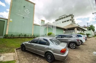 Casa em condomínio fechado com 3 quartos à venda na Avenida John Kennedy, 350, Morro do Espelho, São Leopoldo por R$ 1.200.000