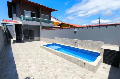 Sobrado geminado com piscina para venda em bairro residencial em mongagua!