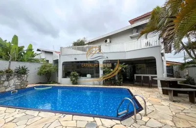 Casa alto padrão próximo ao mar com piscina e churrasqueira para venda!!