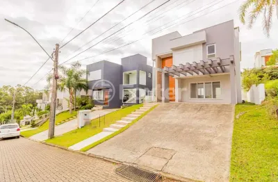 Casa em condomínio fechado com 3 quartos à venda na avenida senador salgado filho, 8500, jardim krahe, viamão, 197 m2 por r$ 1.500.000