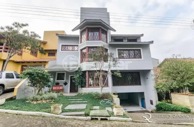 Casa em condomínio fechado com 3 quartos à venda na rua tocantins, 869, lomba do pinheiro, porto alegre, 385 m2 por r$ 1.700.000