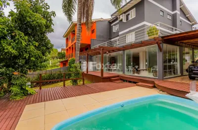 Casa em condomínio fechado com 3 quartos à venda na rua peroba, 131, são lucas, viamão, 403 m2 por r$ 1.100.000