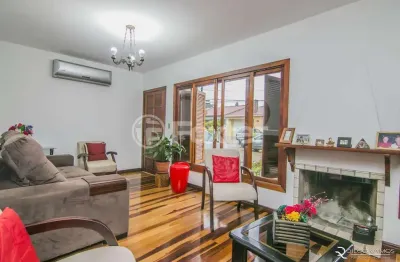 Casa em condomínio fechado com 3 quartos à venda na avenida edgar pires de castro, 1100, hípica, porto alegre, 110 m2 por r$ 450.000