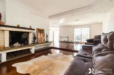 Casa com 4 quartos à venda na rua aluízio de azevedo, 25, jardim itu sabará, porto alegre, 320 m2 por r$ 1.200.000