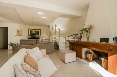 Casa com 4 quartos à venda na rua tomé de souza, 119, nossa senhora das graças, canoas, 257 m2 por r$ 1.400.000