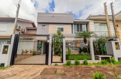 Casa em condomínio fechado com 3 quartos à venda na rua ronaldo molina de quadros, 320, mário quintana, porto alegre, 200 m2 por r$ 900.000