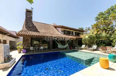 Casa com 5 quartos à venda na rua potiguara, 174, vila assunção, porto alegre, 768 m2 por r$ 4.201.138