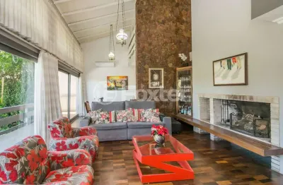 Casa com 3 quartos à venda na rua gustavo schmidt, 20, três figueiras, porto alegre, 313 m2 por r$ 1.950.000