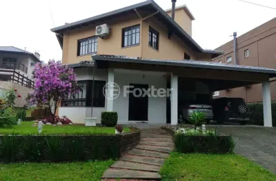 Casa em condomínio fechado com 4 quartos à venda na estrada capitão gentil machado de godoy, 4500, vila elsa, viamão, 380 m2 por r$ 1.300.000