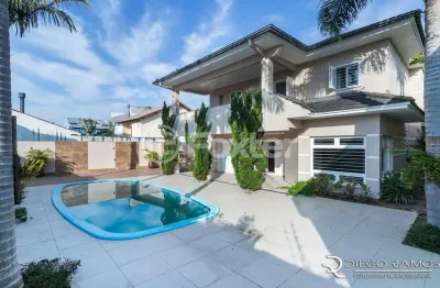 Casa com 4 quartos à venda na rua lagoa do peixe, 170, sarandi, porto alegre, 384 m2 por r$ 2.490.000