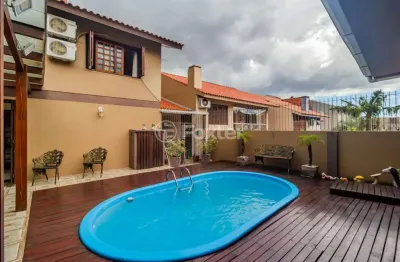 Casa com 4 quartos à venda na rua ari peixoto martins, 190, espírito santo, porto alegre, 258 m2 por r$ 780.000