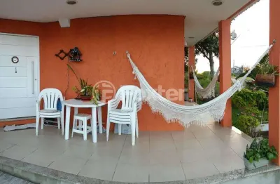 Casa em condomínio fechado com 3 quartos à venda na avenida senador salgado filho, 8500, querência, viamão, 342 m2 por r$ 1.150.000