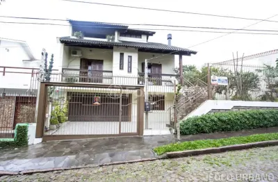 Casa com 3 quartos à venda na rua josé grimberg, 150, parque santa fé, porto alegre, 266 m2 por r$ 890.000