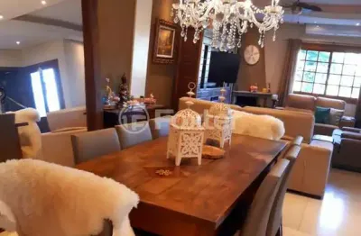 Casa em condomínio fechado com 2 quartos à venda na rua fernando jorge schneider, 741, hípica, porto alegre, 126 m2 por r$ 790.000