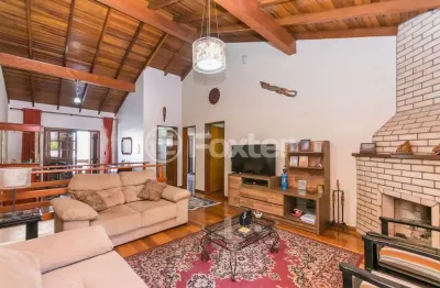 Casa com 4 quartos à venda na rua francisca lechner, 343, parque santa fé, porto alegre, 263 m2 por r$ 650.000