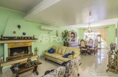 Casa com 4 quartos à venda na rua menezes paredes, 208, nonoai, porto alegre, 262 m2 por r$ 1.330.000