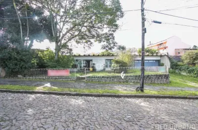 Casa comercial com 3 salas à venda na rua panambi, 54, cavalhada, porto alegre, 256 m2 por r$ 900.000