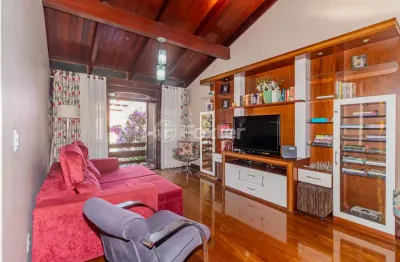 Casa com 4 quartos à venda na rua xavier da cunha, 687, nonoai, porto alegre, 260 m2 por r$ 750.000
