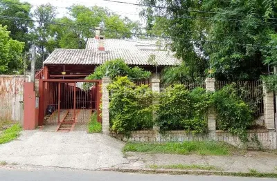 Casa com 5 quartos à venda na avenida heitor vieira, 794, belém novo, porto alegre, 132 m2 por r$ 700.000