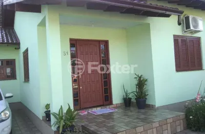 Casa com 4 quartos à venda na rua santa tereza, 31, olaria, canoas, 150 m2 por r$ 400.000