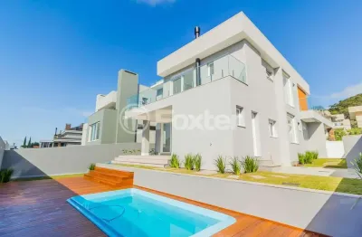 Casa em condomínio fechado com 4 quartos à venda na estrada das três meninas, 2000, vila nova, porto alegre, 298 m2 por r$ 2.270.500