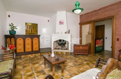 Casa com 4 quartos à venda na rua vicente failace, 466, tristeza, porto alegre, 242 m2 por r$ 845.000