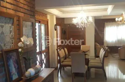 Casa em condomínio fechado com 3 quartos à venda na rua josé henrique barbosa dos santos, 240, dom feliciano, gravataí, 330 m2 por r$ 950.000