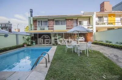 Casa com 3 quartos à venda na rua alcides gonzaga, 50, boa vista, porto alegre, 350 m2 por r$ 1.805.000