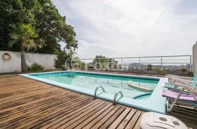 Casa com 4 quartos à venda na rua alcebíades antônio dos santos, 355, nonoai, porto alegre, 420 m2 por r$ 1.700.000
