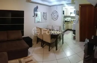 Casa em condomínio fechado com 2 quartos à venda na avenida guarujá, 126, guarujá, porto alegre, 105 m2 por r$ 342.000