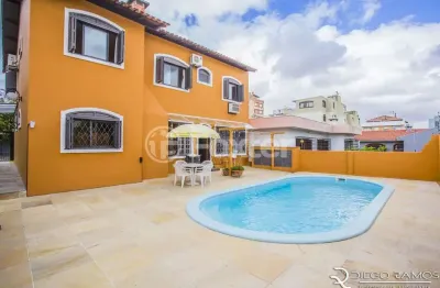 Casa com 3 quartos à venda na rua inhanduí, 340, cristal, porto alegre, 204 m2 por r$ 1.277.000
