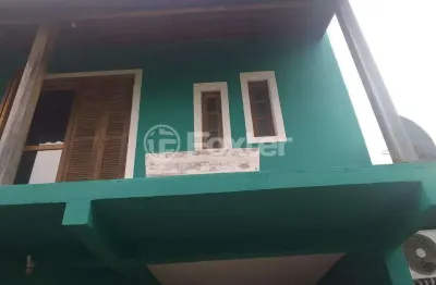Casa com 3 quartos à venda na rua nei remedi, 44, hípica, porto alegre, 127 m2 por r$ 422.750