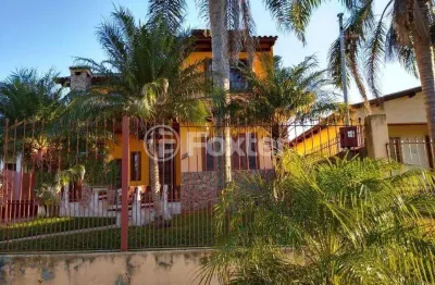 Casa com 4 quartos à venda na rua carazinho, 100, cocão, viamão, 134 m2 por r$ 500.000