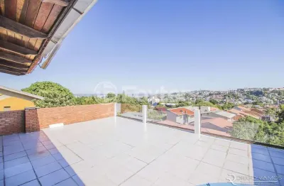 Casa com 3 quartos à venda na rua coronel ruy da cunha paim, 55, nonoai, porto alegre, 600 m2 por r$ 1.060.000