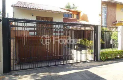 Casa com 3 quartos à venda na rua doutor mário totta, 1440, tristeza, porto alegre, 287 m2 por r$ 1.250.000