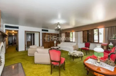 Casa com 4 quartos à venda na rua omagua, 68, vila assunção, porto alegre, 563 m2 por r$ 2.870.000